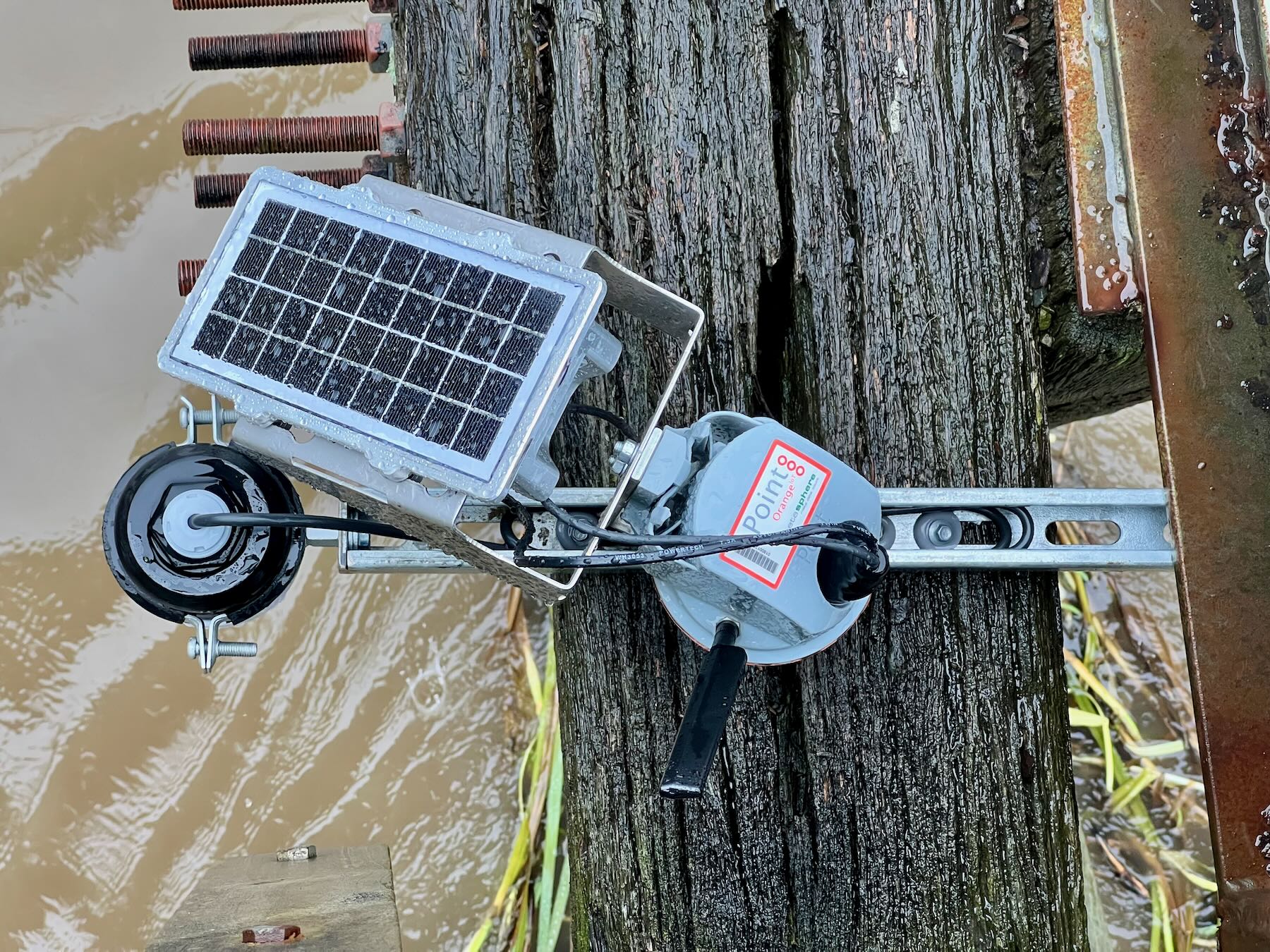 Device with small solar panel attached to the footbridge. 